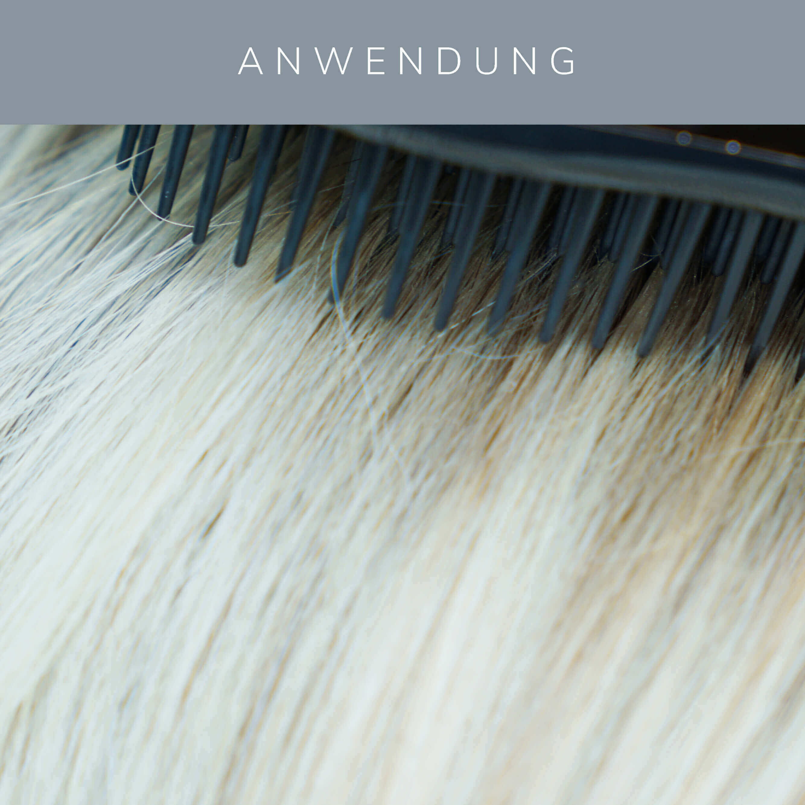 Close-up of the Nature Brush detangler combing through light blonde hair, showcasing its natural bristles and nylon tips.